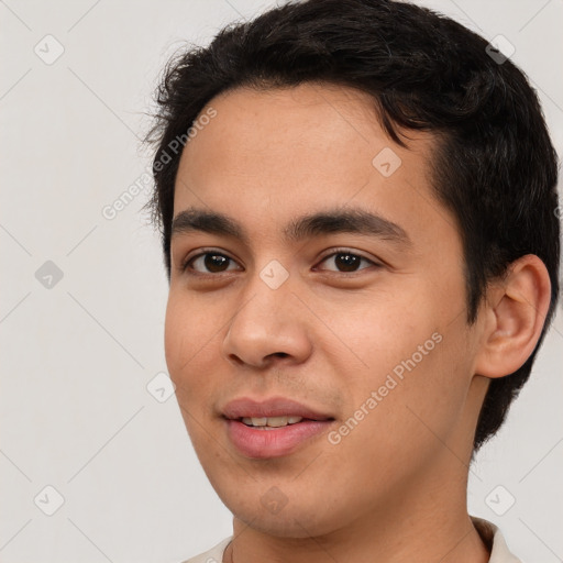 Joyful latino young-adult male with short  black hair and brown eyes