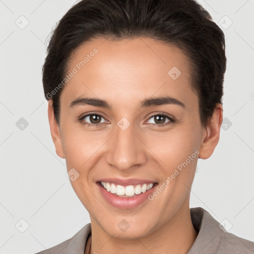 Joyful white young-adult female with short  brown hair and brown eyes