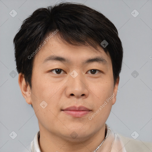 Neutral asian young-adult male with short  brown hair and brown eyes