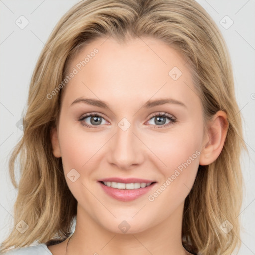 Joyful white young-adult female with long  brown hair and blue eyes