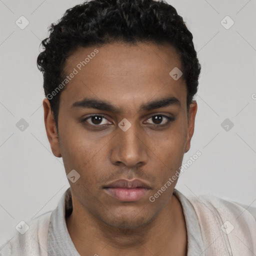 Neutral white young-adult male with short  black hair and brown eyes