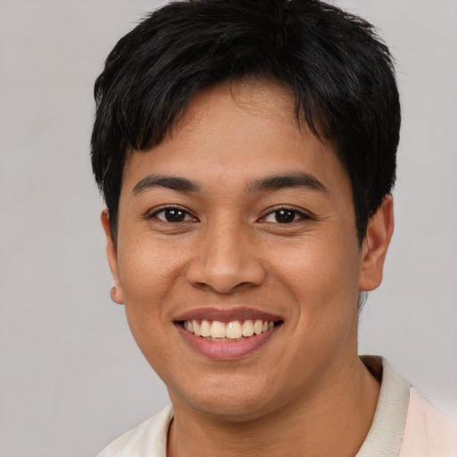 Joyful asian young-adult female with short  brown hair and brown eyes