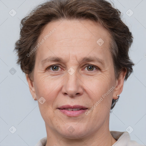 Joyful white adult female with short  brown hair and brown eyes