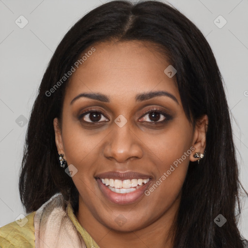 Joyful latino young-adult female with long  black hair and brown eyes