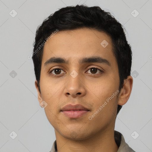 Neutral latino young-adult male with short  black hair and brown eyes