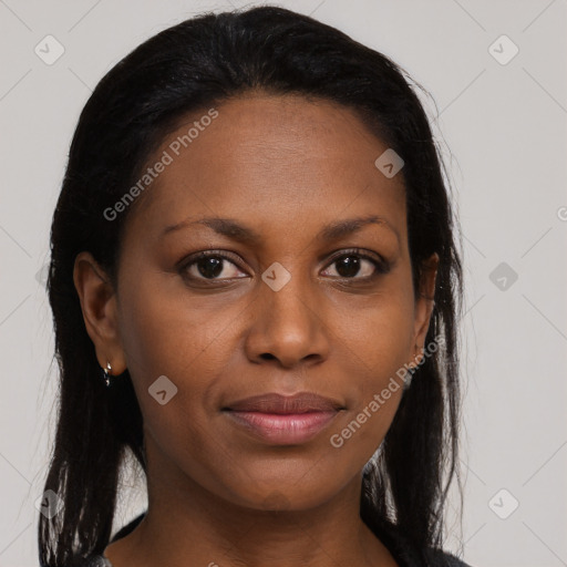 Joyful black young-adult female with medium  brown hair and brown eyes