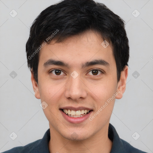 Joyful white young-adult male with short  black hair and brown eyes