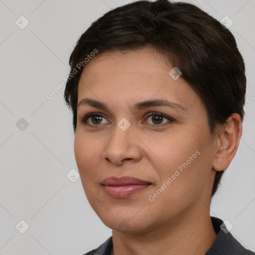 Joyful white young-adult female with short  brown hair and brown eyes