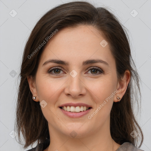 Joyful white young-adult female with medium  brown hair and brown eyes