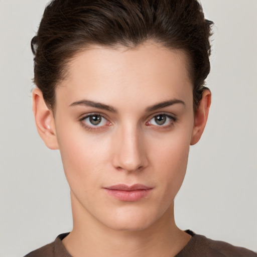 Neutral white young-adult female with short  brown hair and brown eyes