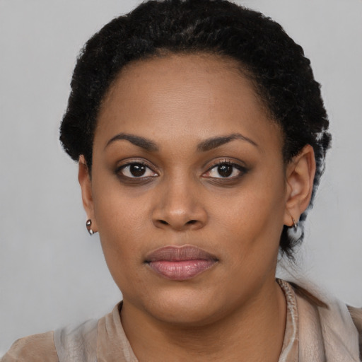 Neutral black young-adult female with short  black hair and brown eyes