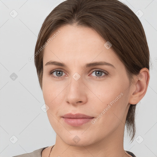 Neutral white young-adult female with medium  brown hair and grey eyes