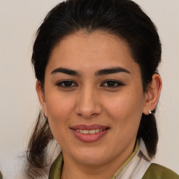 Joyful asian young-adult female with medium  brown hair and brown eyes