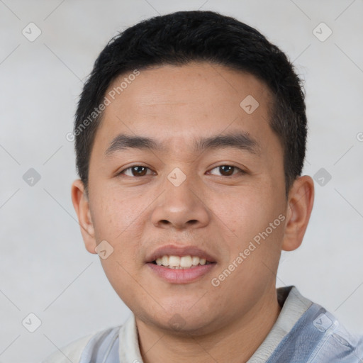 Joyful white young-adult male with short  black hair and brown eyes