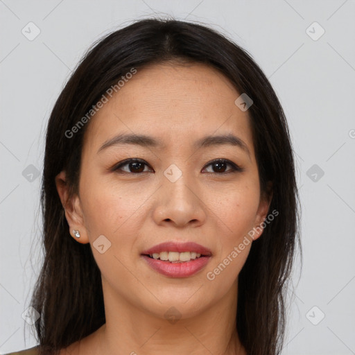 Joyful asian young-adult female with long  brown hair and brown eyes