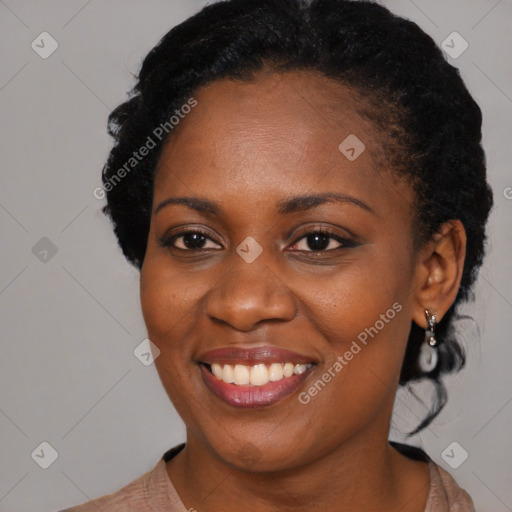 Joyful black young-adult female with medium  black hair and brown eyes