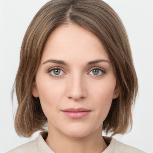 Neutral white young-adult female with medium  brown hair and green eyes