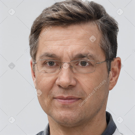 Joyful white middle-aged male with short  brown hair and brown eyes