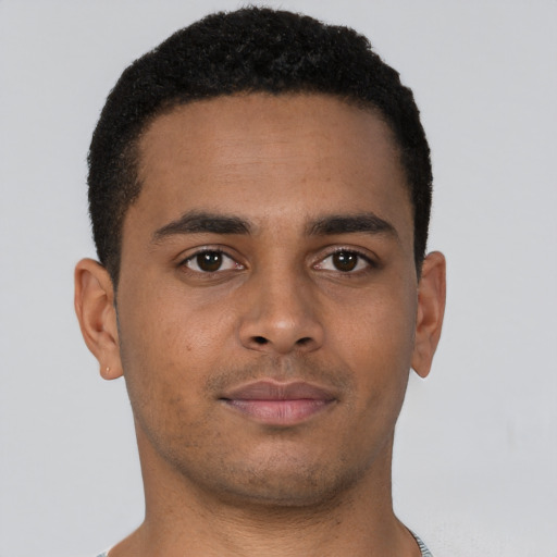 Neutral black young-adult male with short  brown hair and brown eyes
