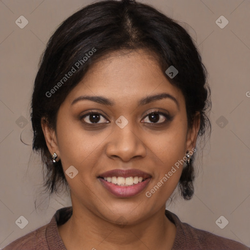 Joyful black young-adult female with medium  brown hair and brown eyes