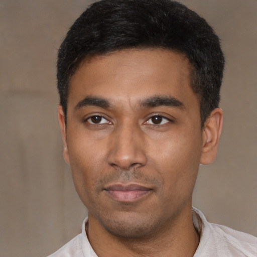 Neutral latino young-adult male with short  black hair and brown eyes