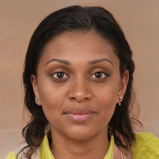 Joyful white young-adult female with medium  brown hair and brown eyes