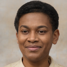 Joyful latino young-adult male with short  brown hair and brown eyes