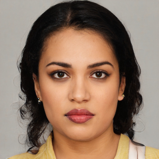 Neutral latino young-adult female with medium  black hair and brown eyes