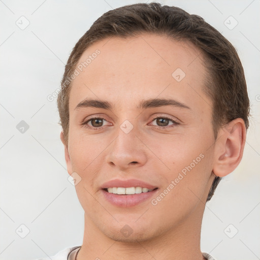 Joyful white young-adult female with short  brown hair and brown eyes