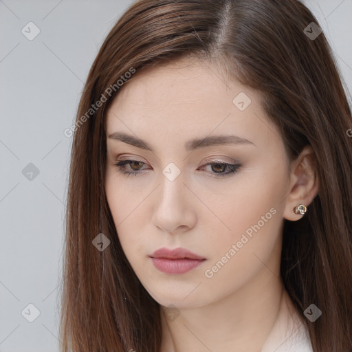 Neutral white young-adult female with long  brown hair and brown eyes