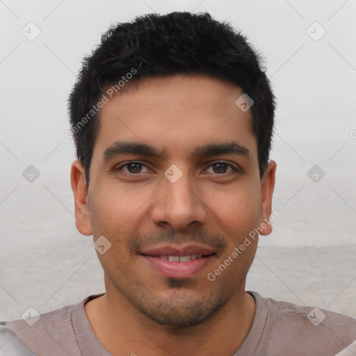 Joyful white young-adult male with short  black hair and brown eyes