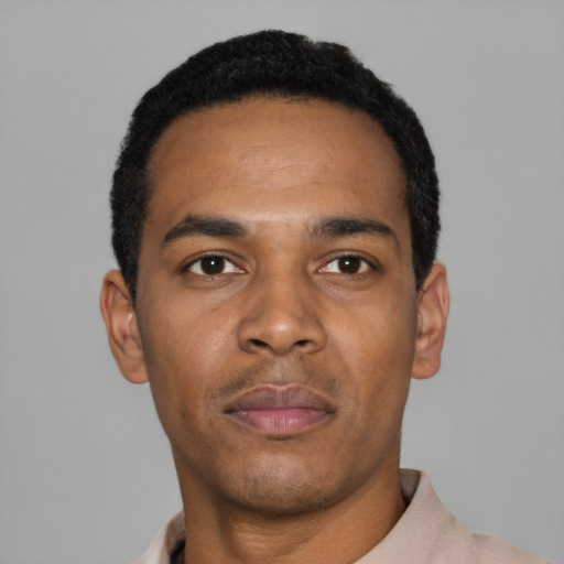 Neutral black young-adult male with short  black hair and brown eyes