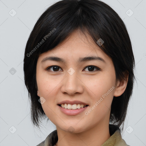 Joyful asian young-adult female with medium  brown hair and brown eyes