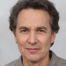 Joyful white middle-aged male with short  brown hair and brown eyes