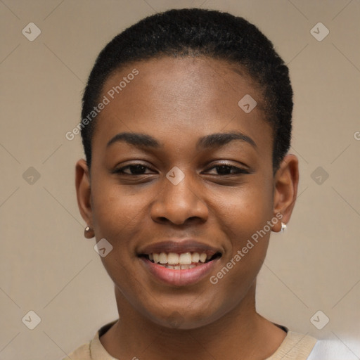 Joyful black young-adult female with short  black hair and brown eyes