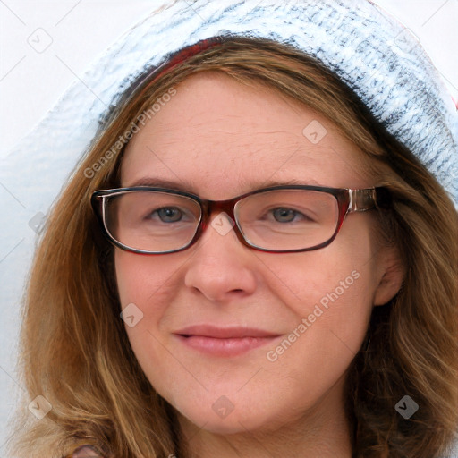 Joyful white young-adult female with long  brown hair and blue eyes