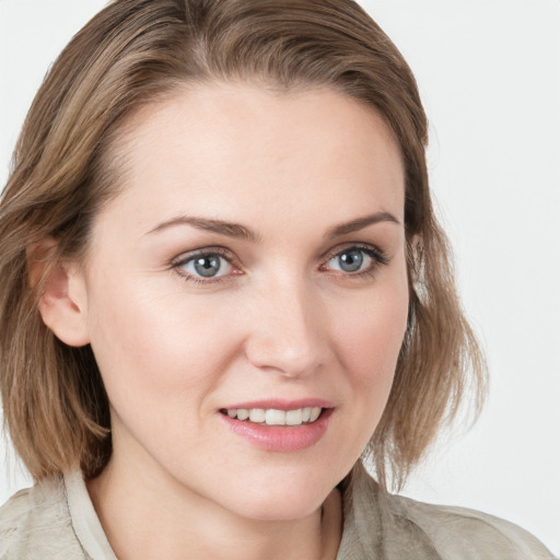 Joyful white young-adult female with medium  brown hair and blue eyes