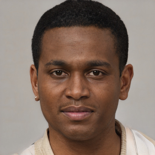 Neutral latino young-adult male with short  brown hair and brown eyes