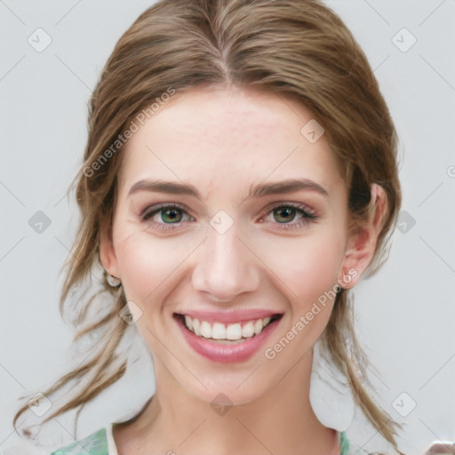 Joyful white young-adult female with medium  brown hair and blue eyes