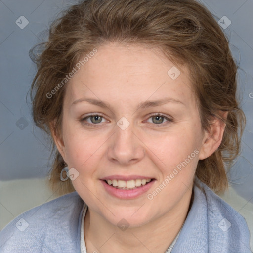 Joyful white young-adult female with medium  brown hair and blue eyes