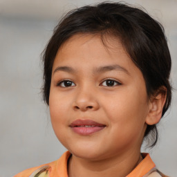 Joyful white child female with medium  brown hair and brown eyes