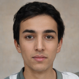 Neutral white young-adult male with short  black hair and brown eyes