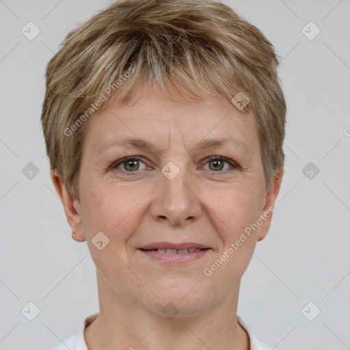 Joyful white adult female with short  brown hair and brown eyes