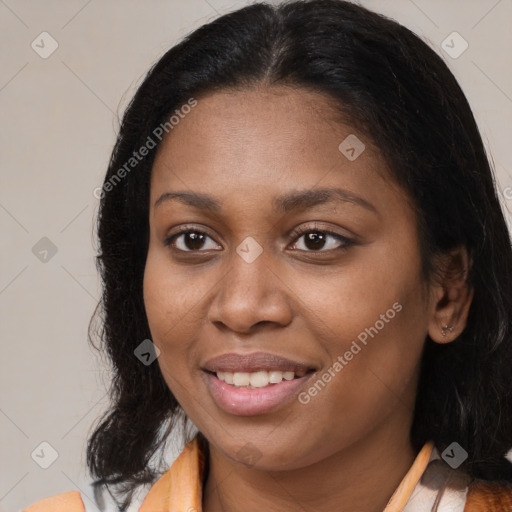 Joyful latino young-adult female with long  brown hair and brown eyes