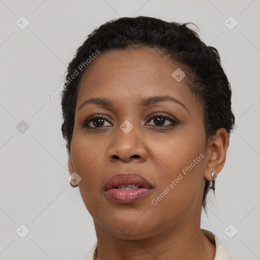 Neutral black young-adult female with short  brown hair and brown eyes