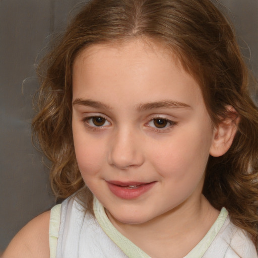 Joyful white child female with medium  brown hair and brown eyes