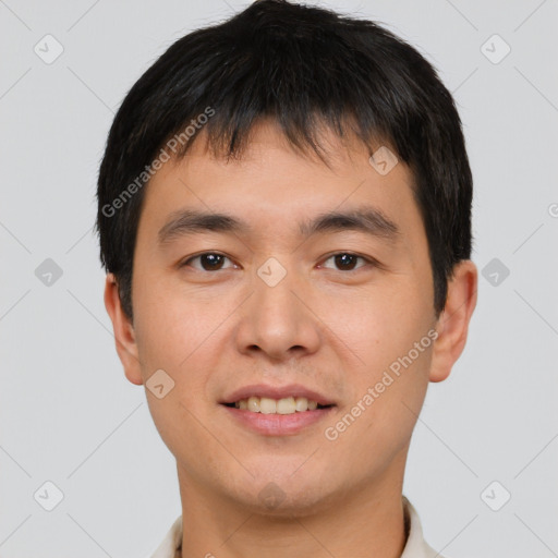 Joyful asian young-adult male with short  brown hair and brown eyes