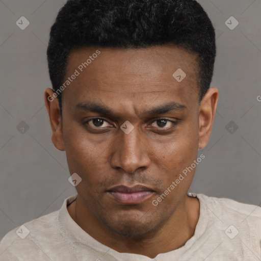 Neutral black young-adult male with short  black hair and brown eyes