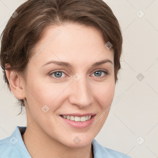 Joyful white young-adult female with medium  brown hair and blue eyes