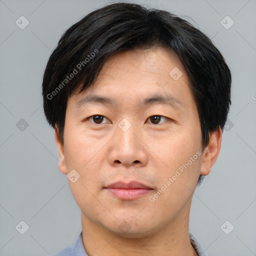 Neutral asian adult male with short  black hair and brown eyes